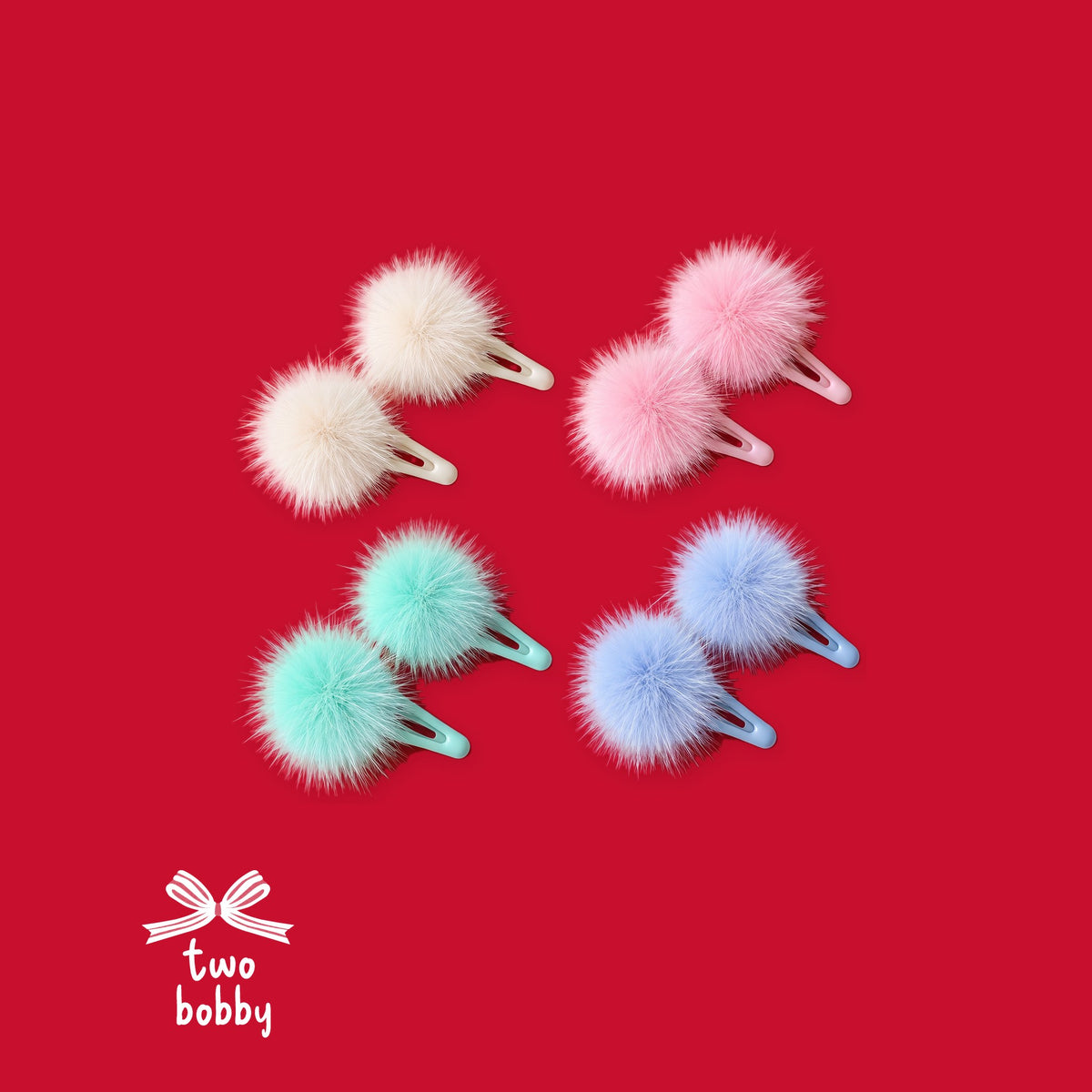 Fluffy Faux Fur Pom Pom Clips, all four colours on the two bobby red
