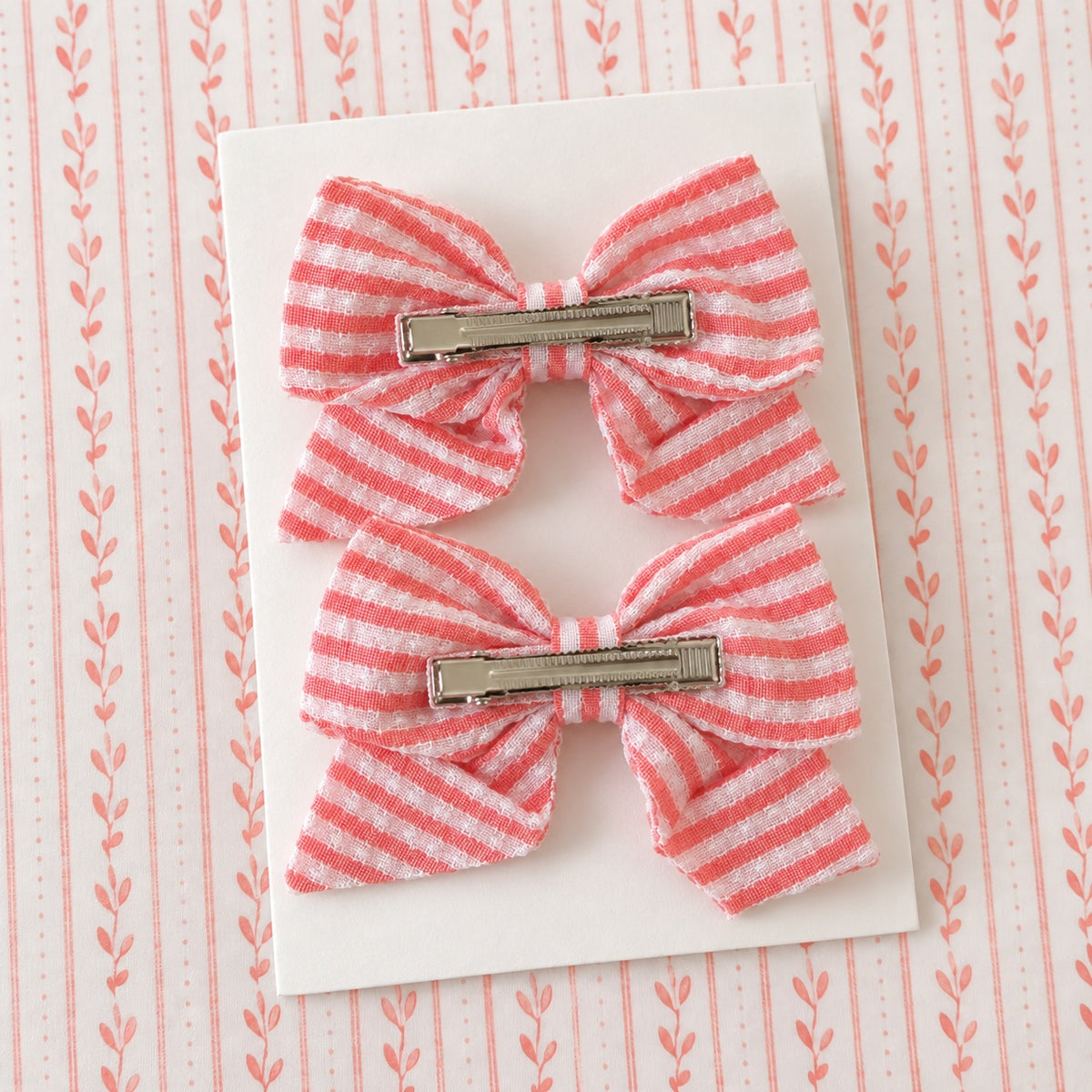 two bobby Candy Stripe Bow Clips – Pair – back view with alligator clips