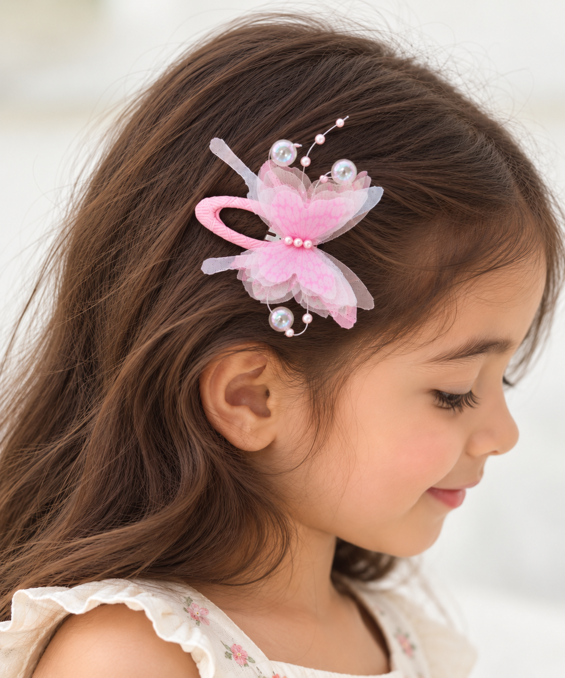 two bobby Candy Floss Butterfly Tic Tacs – Pair – pink, worn in hair