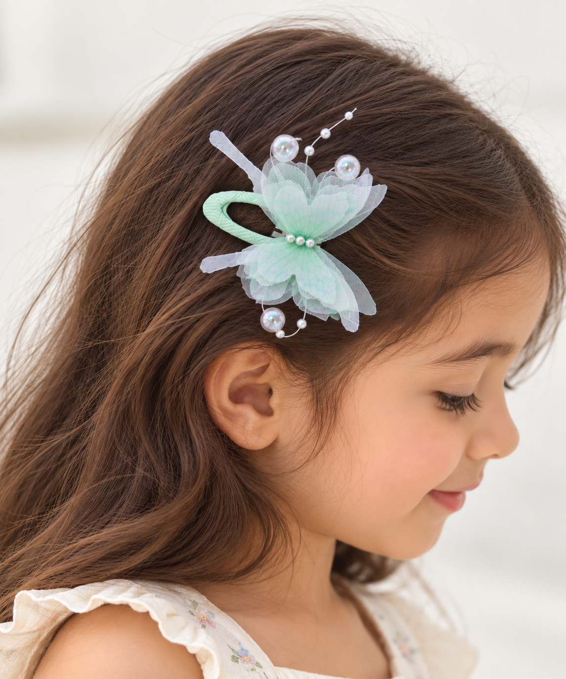 two bobby Candy Floss Butterfly Tic Tacs – Pair – green, worn in hair
