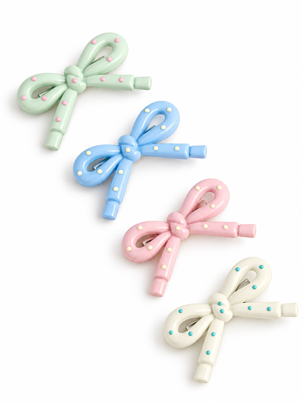 two bobby Sprinkles Bow Clips – Pack of 4 – all four colours