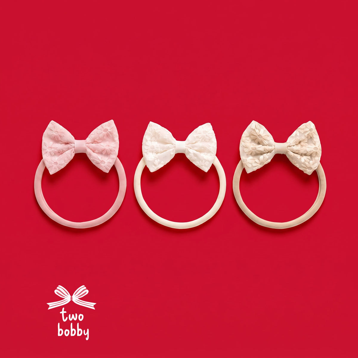 Bohemian Lace Baby Headbands - Pack of 3 on a red background with the two bobby logo