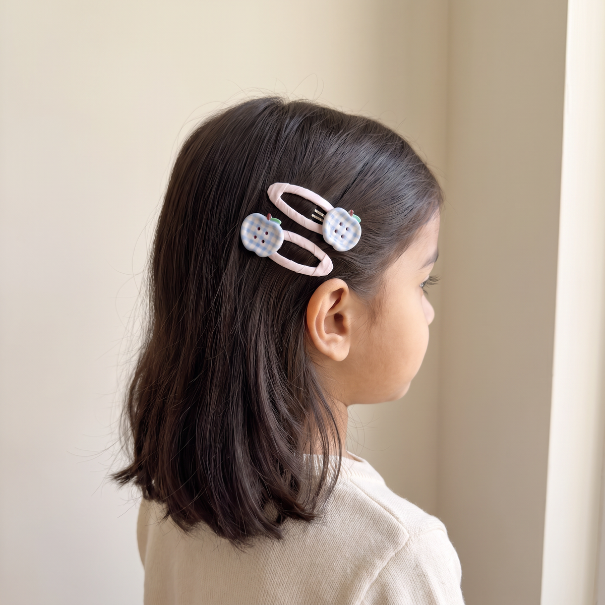 two bobby Gingham Apple Snap Clips – Pink, worn