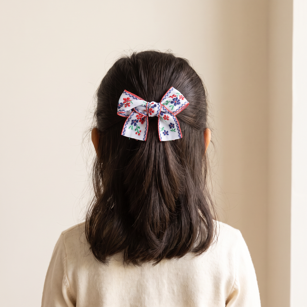 two bobby Embroidered Floral Bow – White, worn