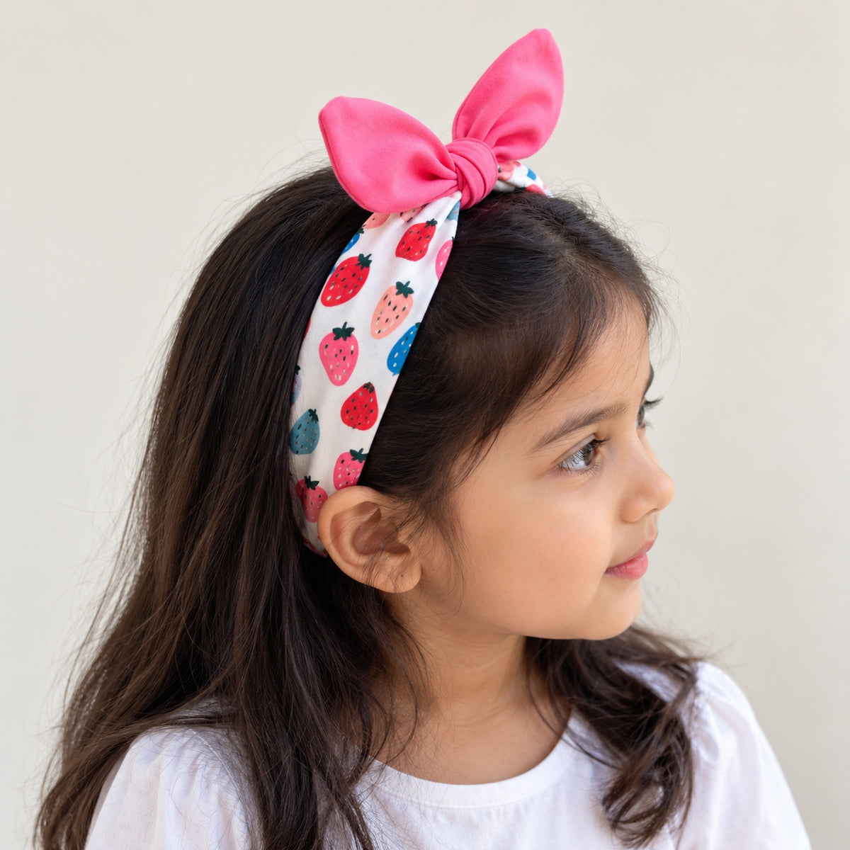 two bobby Strawberry Patch Knot Headband – pink, worn