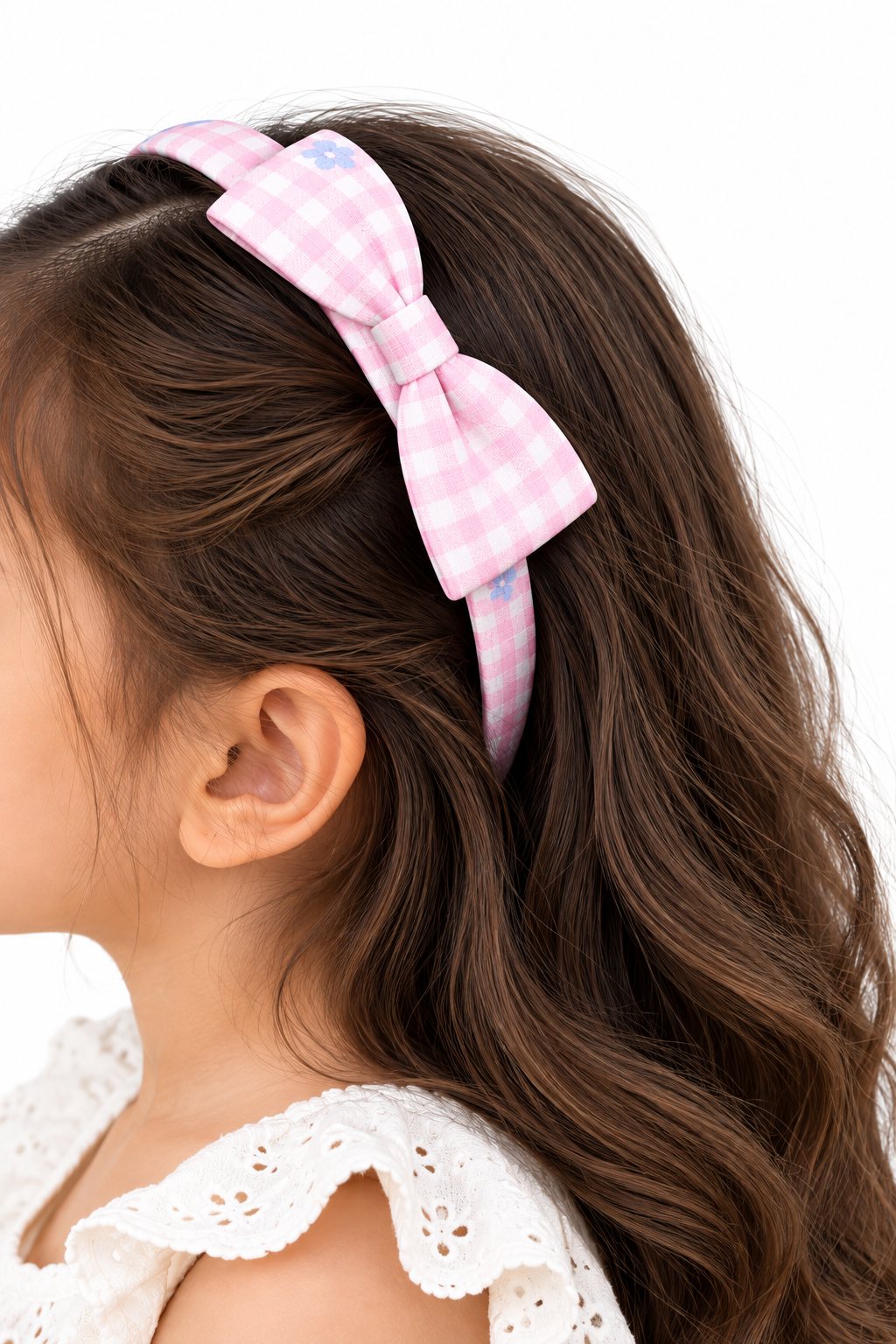 two bobby Gingham Daisy Bow Headband – pink, worn