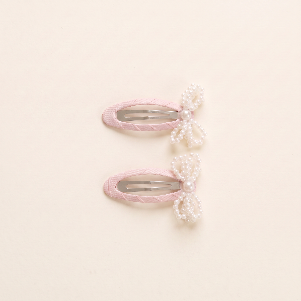 two bobby Mini Pearl Bow Snap Clips - Pink, pair