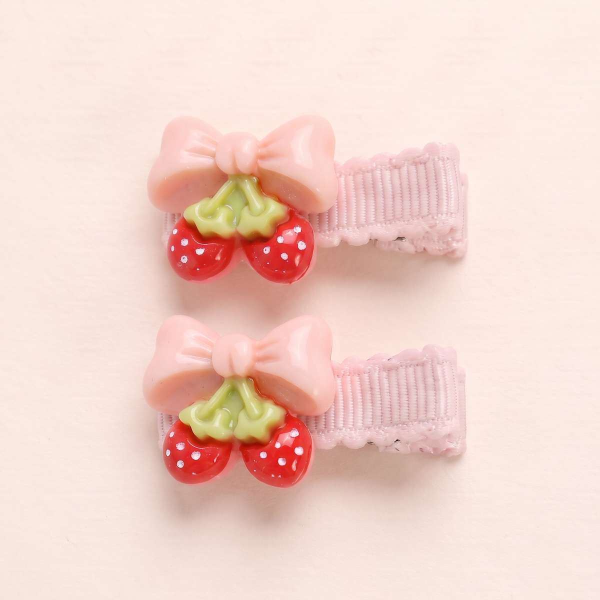 two bobby Fruit Charm Bow Clips – Close-up of one pair