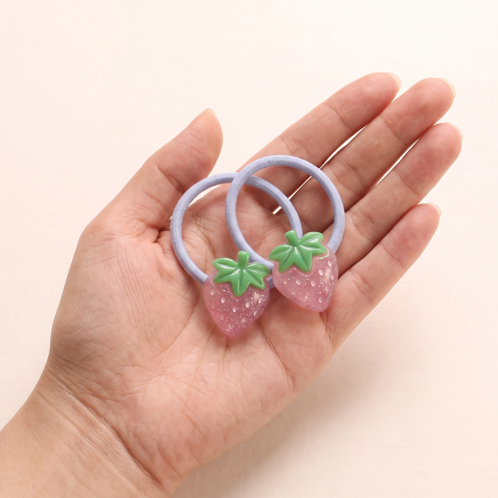 two bobby Jelly Fruit Hair Ties – One pair in hand, for size
