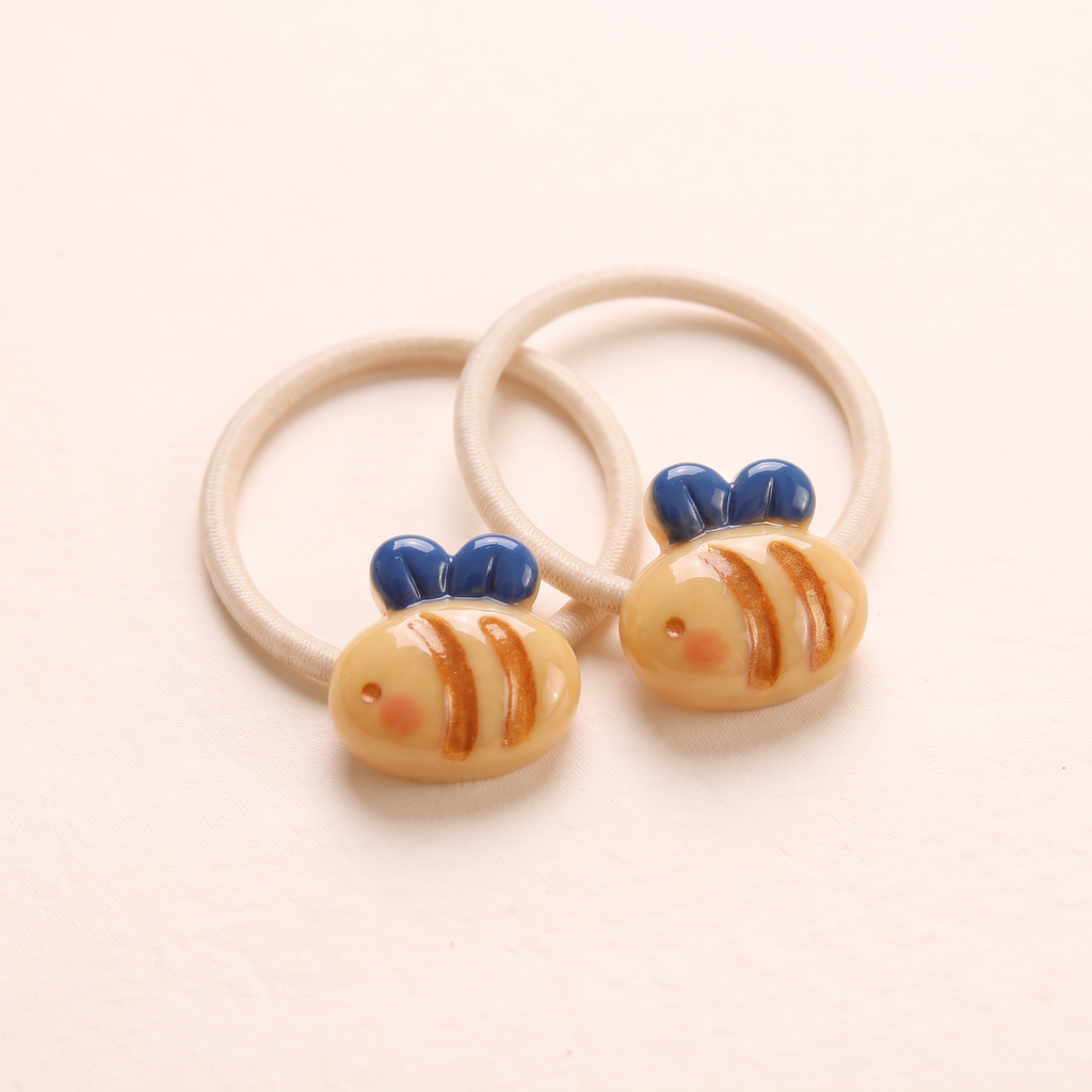 two bobby Garden Friends Hair Ties – Close-up of one pair