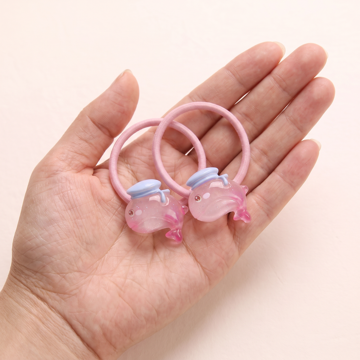 two bobby Jelly Sea Friends Hair Ties – One pair in hand, for size