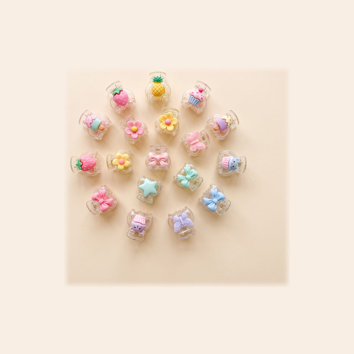 two bobby Charm Mini Claw Clips - the mix of charms and colours your set of 4 is picked from