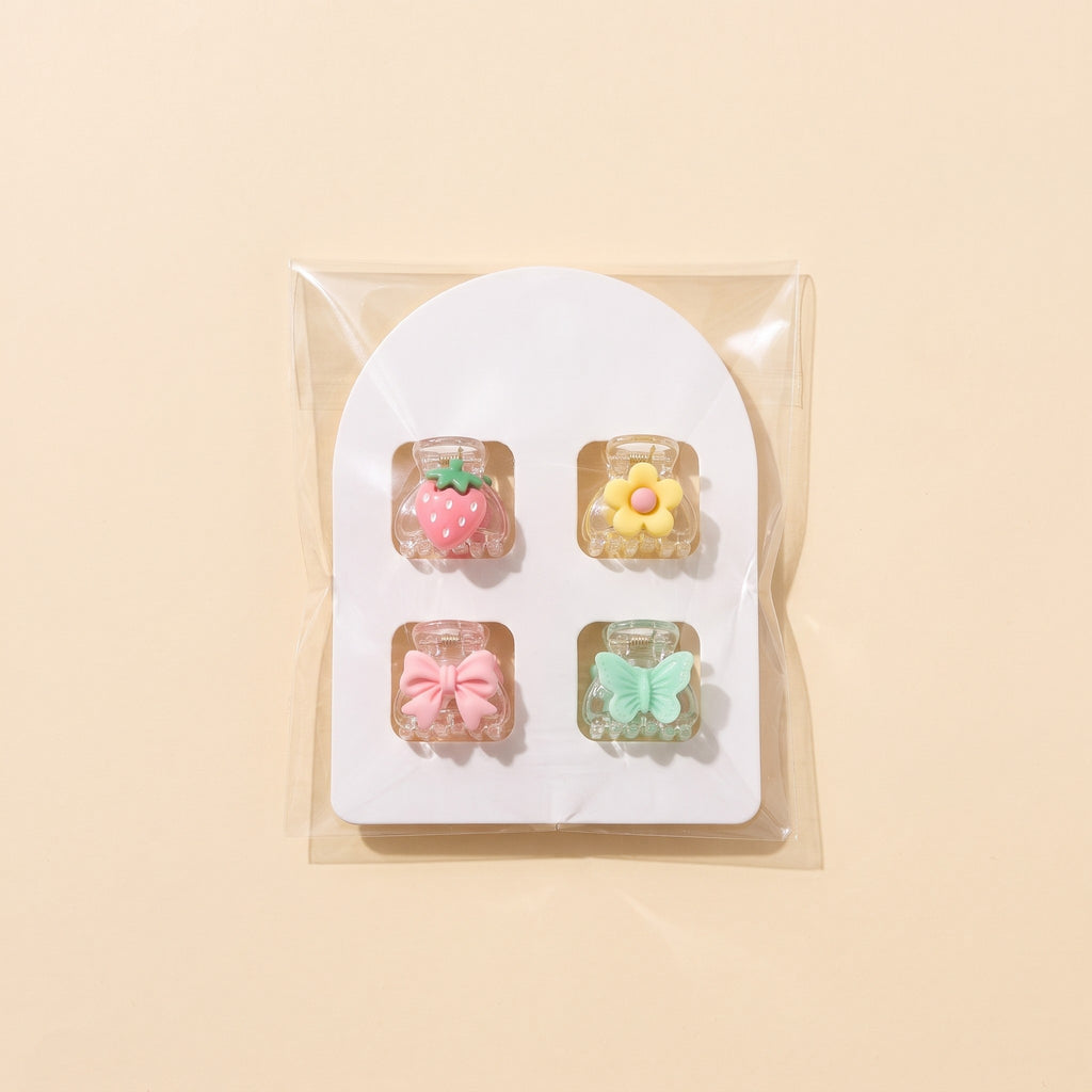 One card of 4 charm mini claw clips as it ships