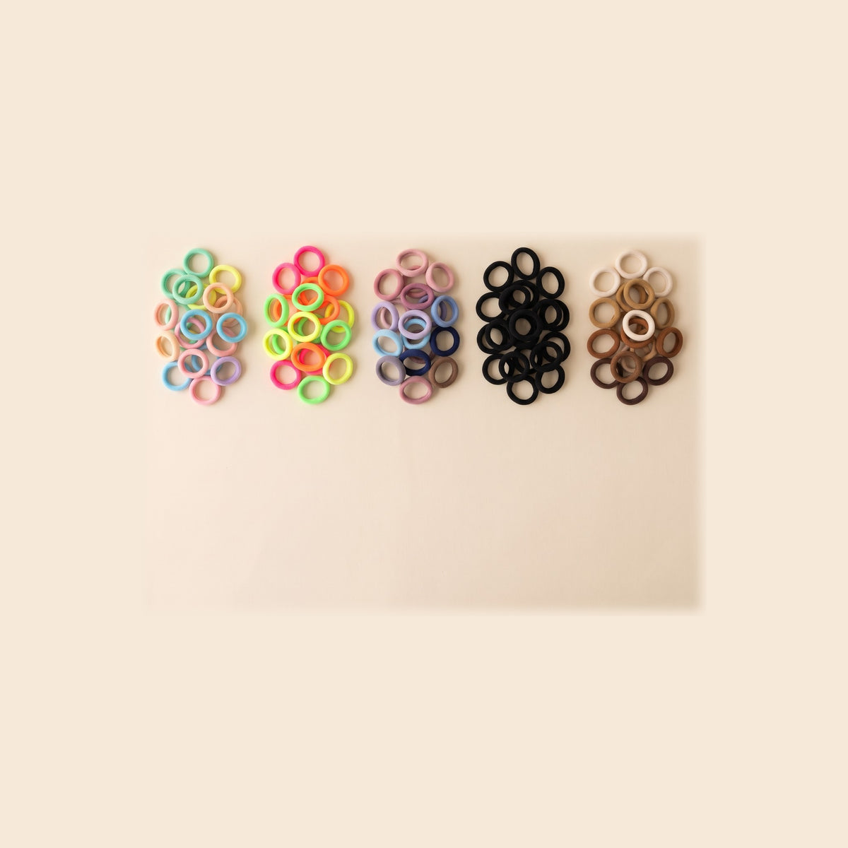All five colour mixes of two bobby Everyday Rubber Band Hair Ties: Candy, Neon, Dusty, Black, Neutrals