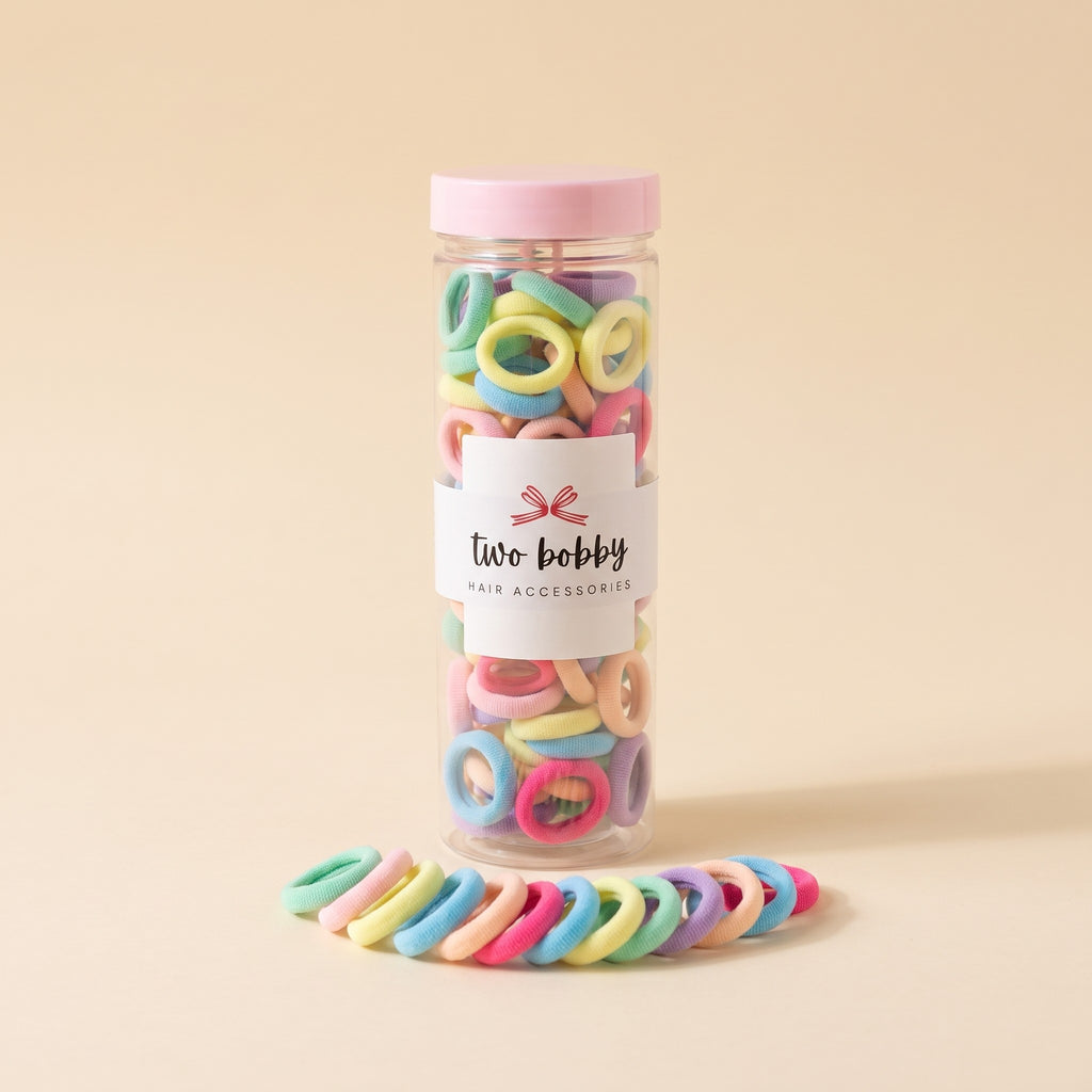 The two bobby tube of 100 hair ties with its lid, Candy mix