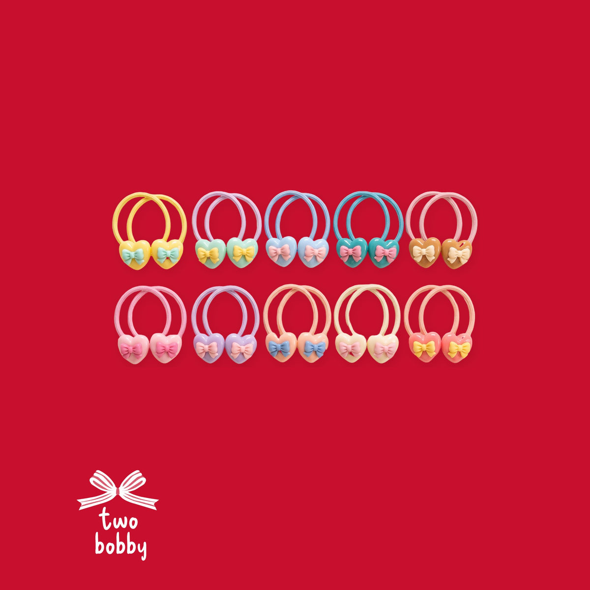 All 10 heart bow hair tie designs on two bobby red